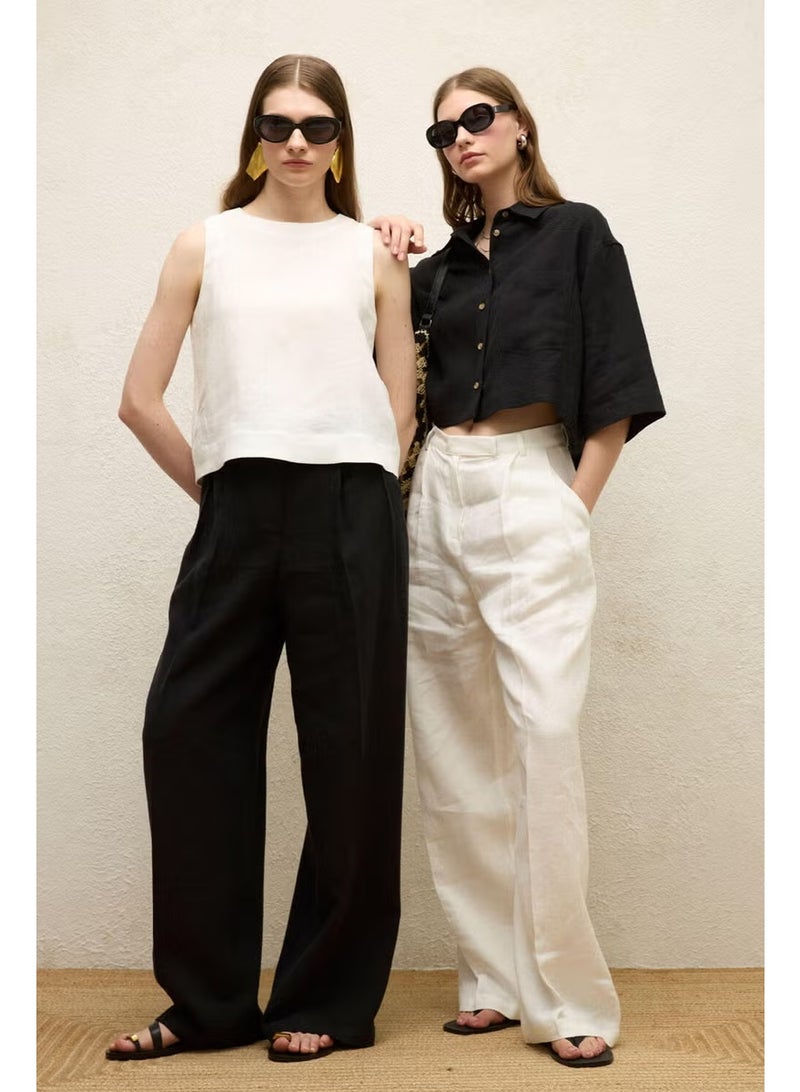 Manuka Zero Sleeve Linen Blouse Ecru - Image 1